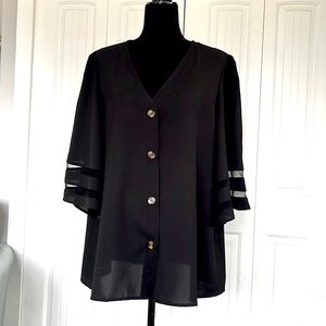 Loose fit, Black top with bell sleeves, sheer panels and buttons. Size 2X